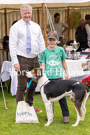 0021 Melbreak Warrior and Owen Liddle (9yrs) win the Best Walked Unentered Foxhound Dog